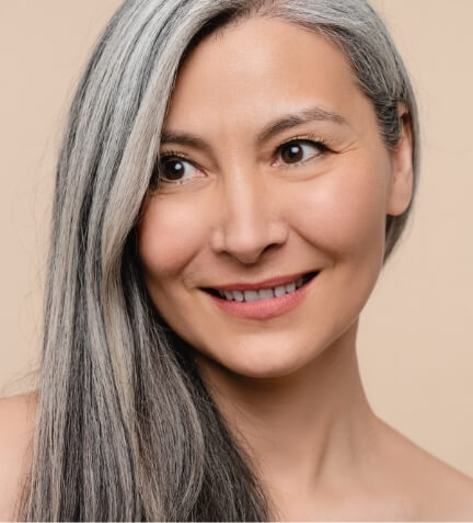woman-with-long-grey-hair-hair-care-and-treatment-2023-11-27-04-56-03-utc (1)